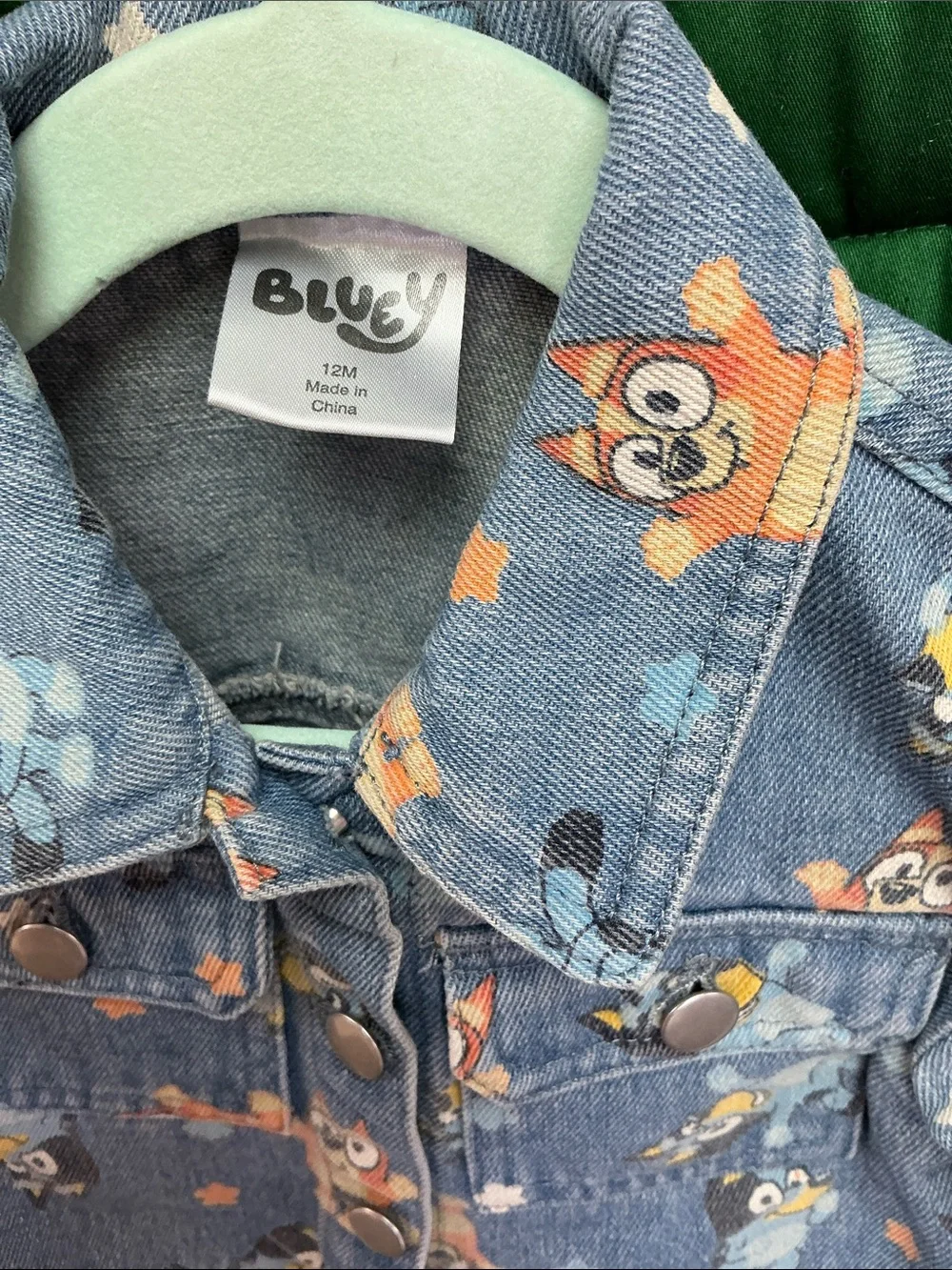 Bluey denim infant jacket. Size 12mos. Two front pockets.